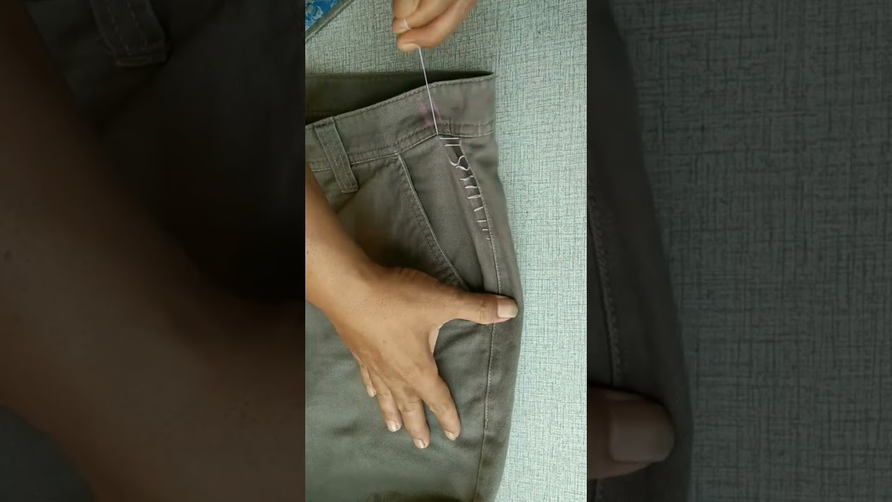 Sewing method for tightening the fit at the waist of loose trousers
