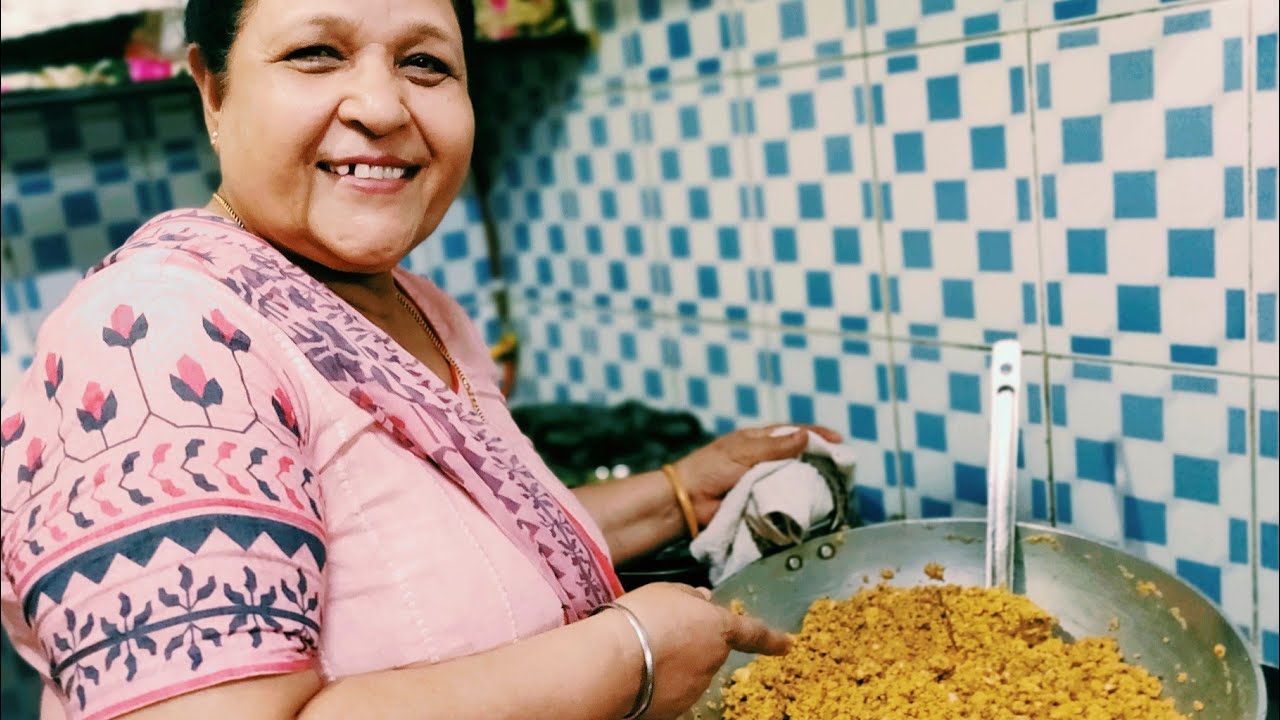 punjabi family making besan ki panjiri - nutritious and healty- recommended for post pregnancy.