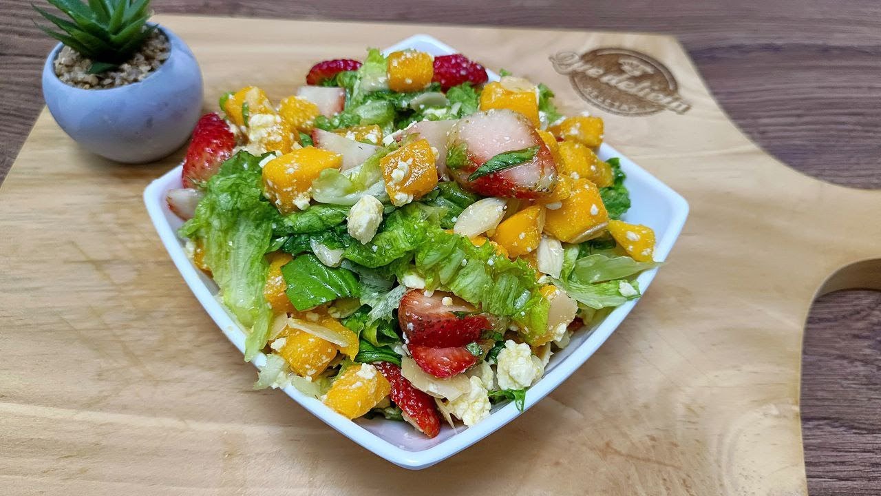 A must-try salad of lettuce, mango, and strawberry. 