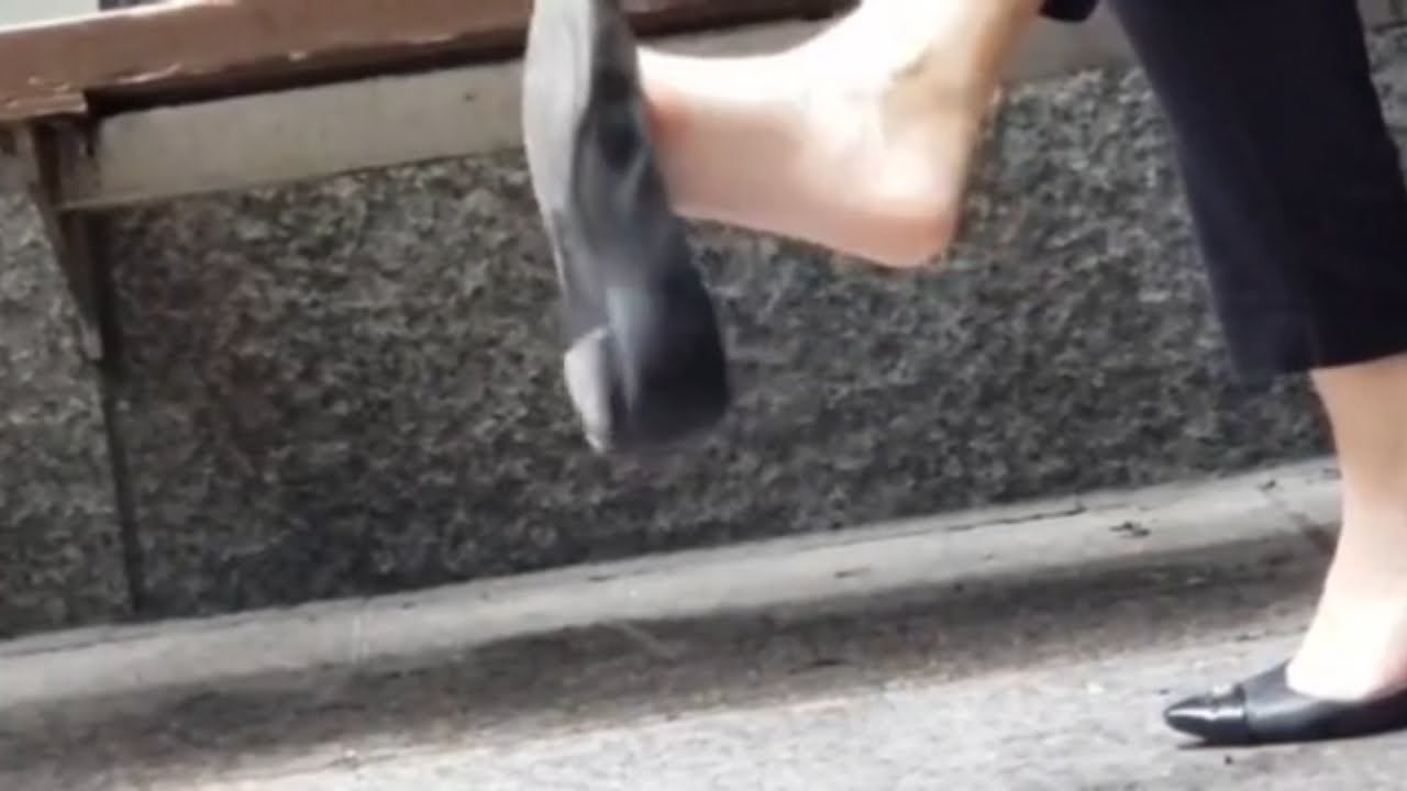 Candid black flats dangling shoeplay outside part 1