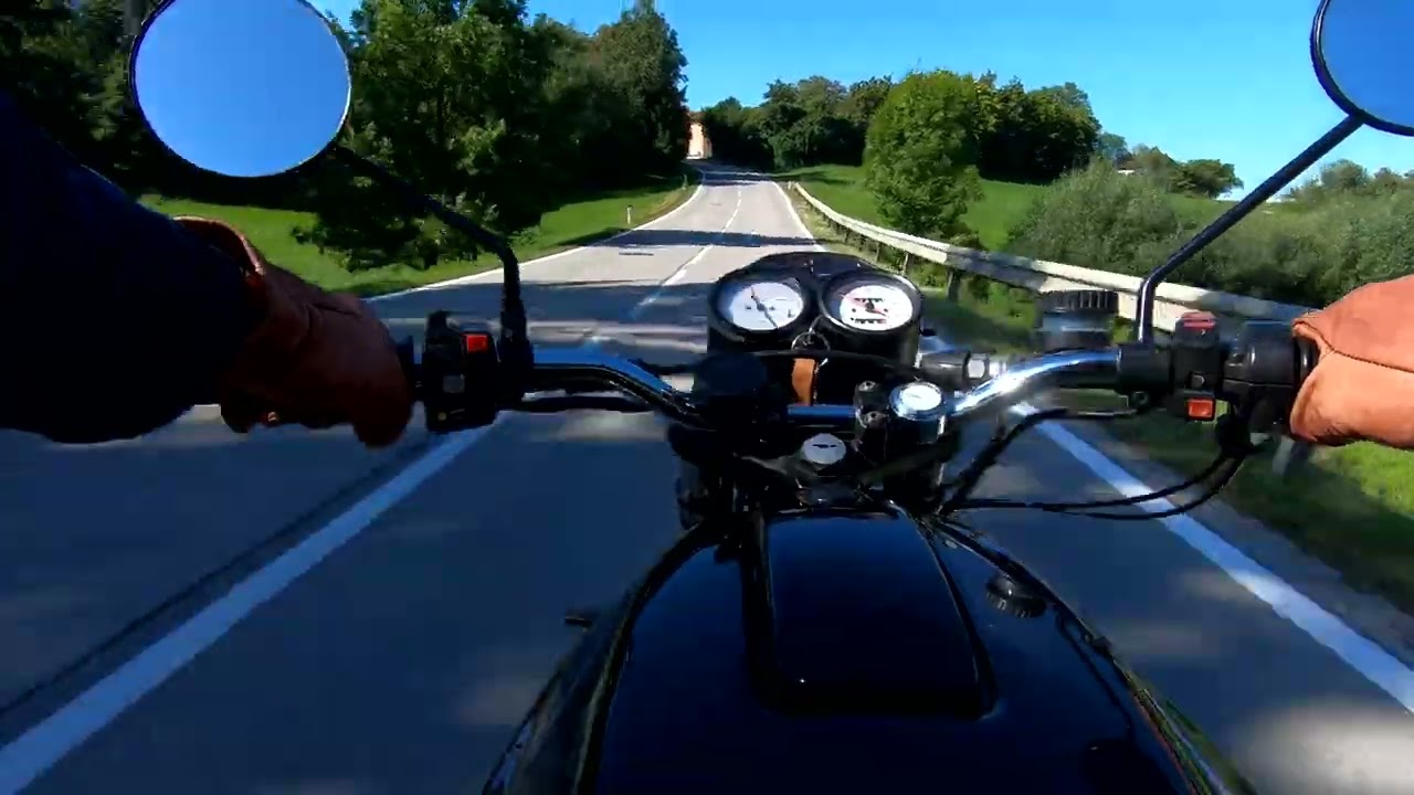 on the road with a "Moto Guzzi 850-T5 cafe racer, 1987"