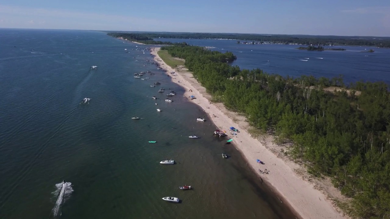 Unedited Flyover Boaters Beach at Sandy Pond on Saturday, June, 20, 2020.
