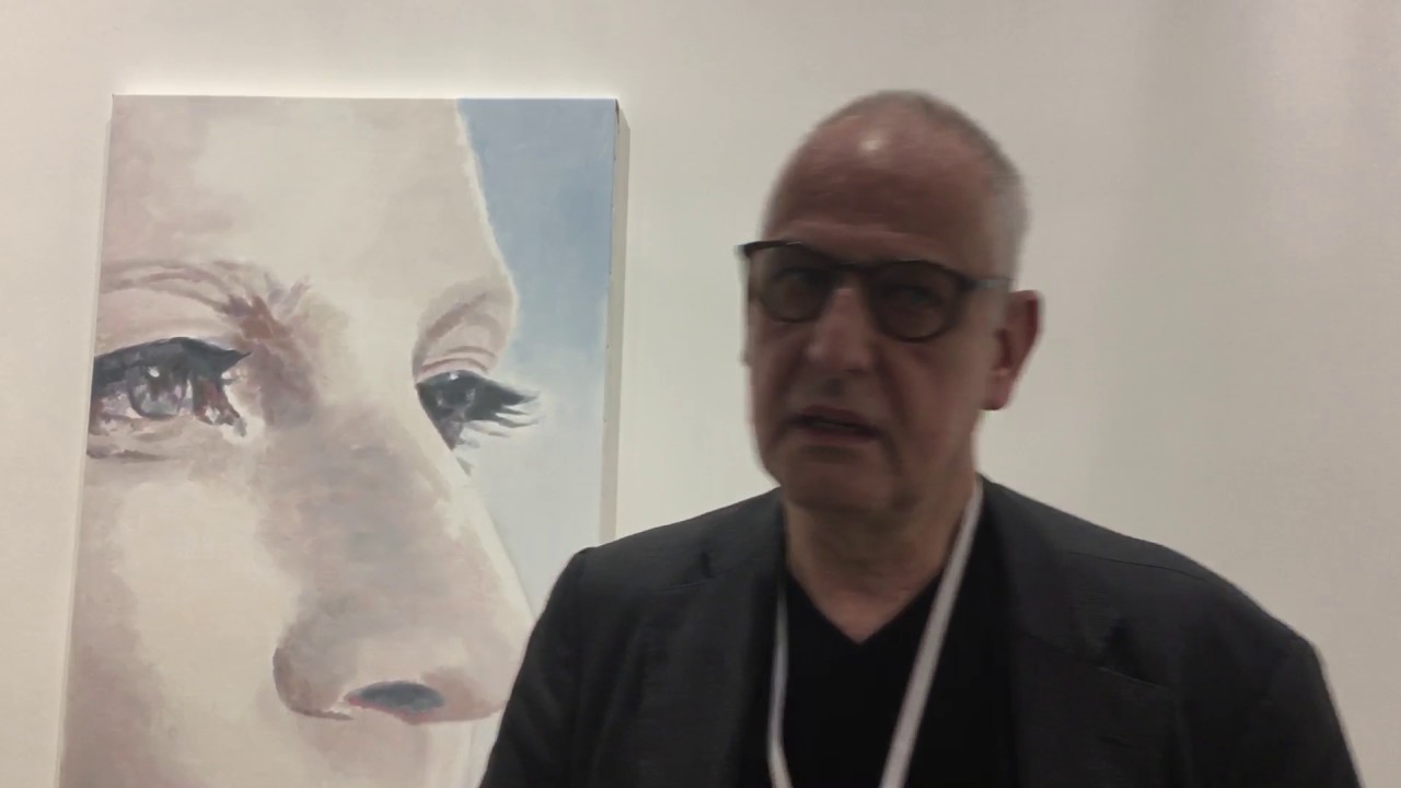 Luc Tuymans speaks about one of his paintings during Art Basel Hong Kong