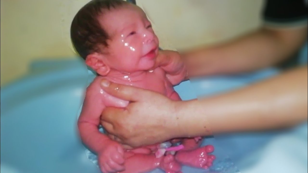First shower of newborn baby after birth | newborn baby bath