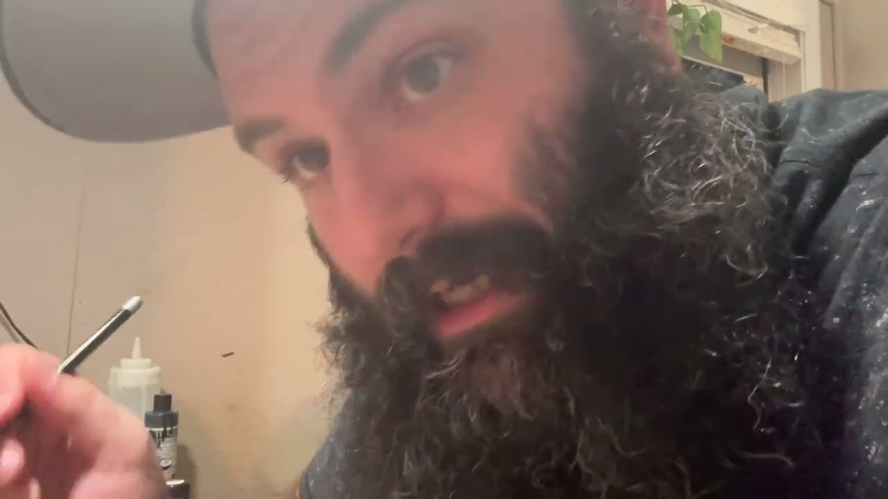 Bald man rants about AI