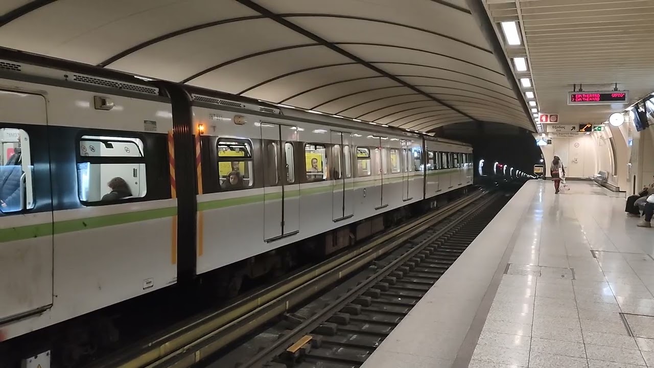 Athens Metro 3rd generation train arriving and departing ambelokipi station 