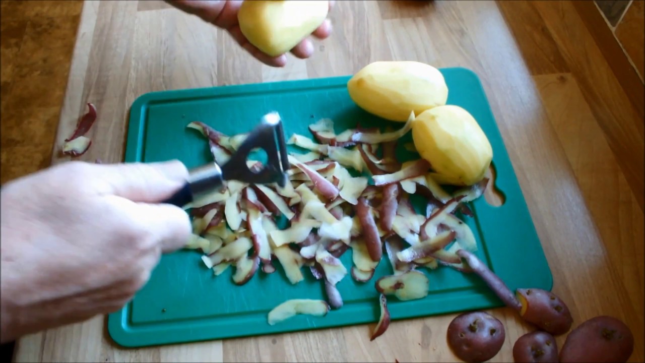 Growing potatoes from potato peelings  It's a long job.