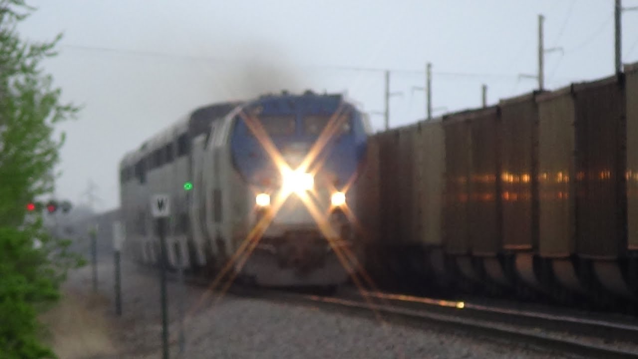 Coal Train Meets On Time Amtrak That Gives Shave and a Haircut