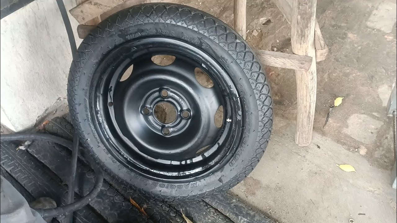 Fazendo adapta&ccedil;&atilde;o em aro de biz com aro 13 de carro veja o resultado