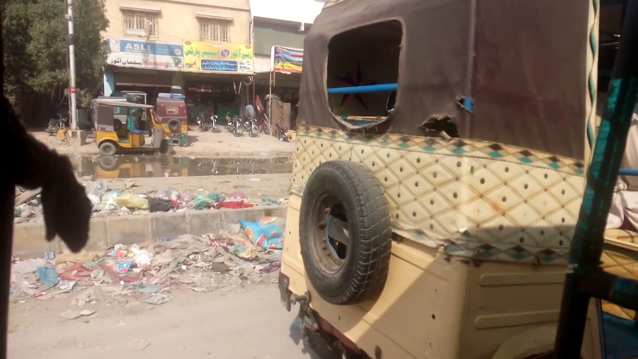 Broken Roads, Footpath and Garbage at Abdul Hasan Isphahani Road Karachi