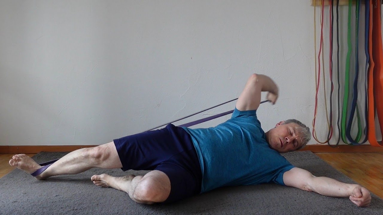 Train your triceps with resistance band overhead triceps extensions