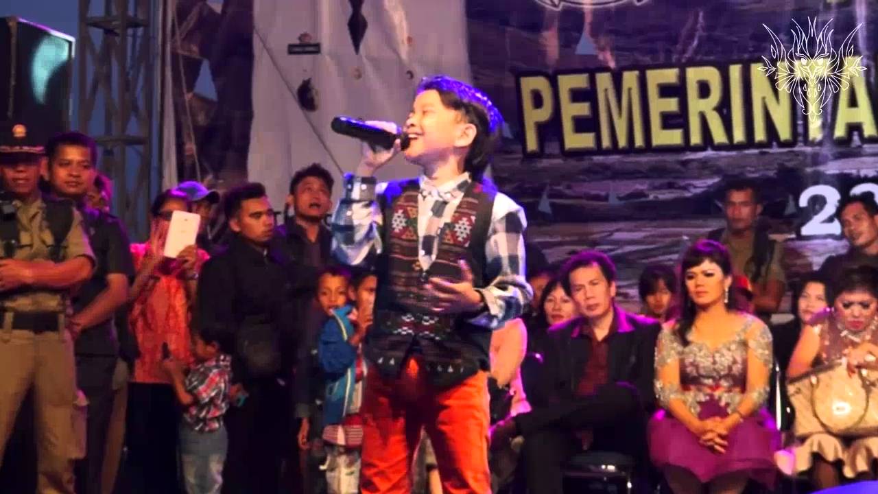 Jojo Tinambunan Feat Dompak sinaga