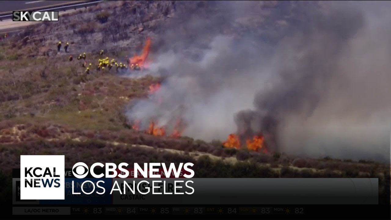 Car fire on the 5 Freeway ignites Castaic brush fire