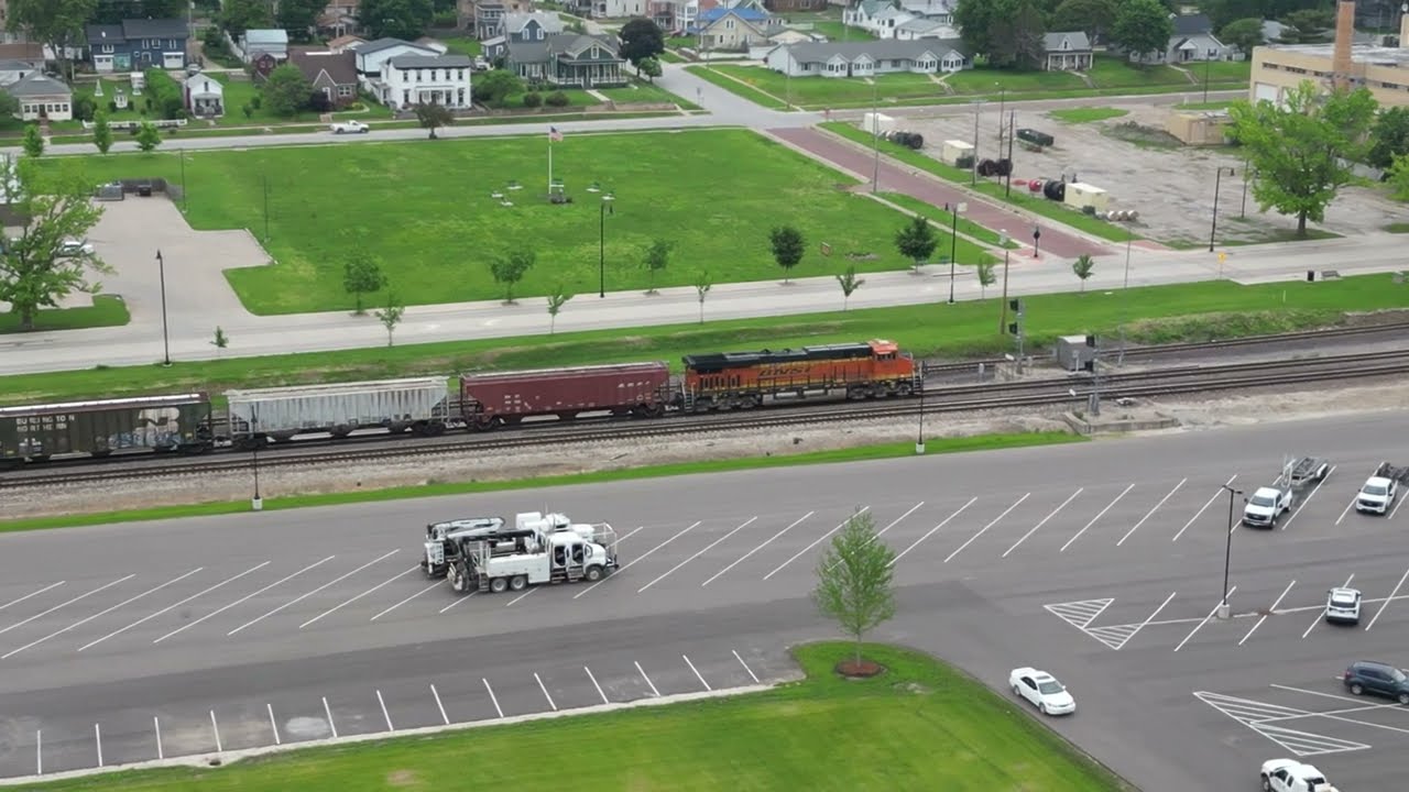 Trains and a full 15 barge tow, Mississippi River at Ft Madison Iowa.