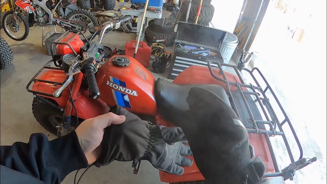 Riding 84 Honda ATC 200ES in the snow