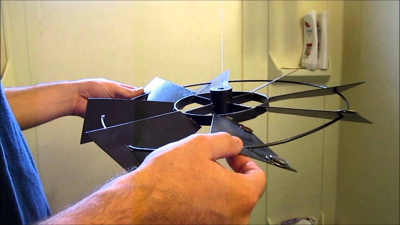 Balancing a decorative windmill using coins to remove vibration