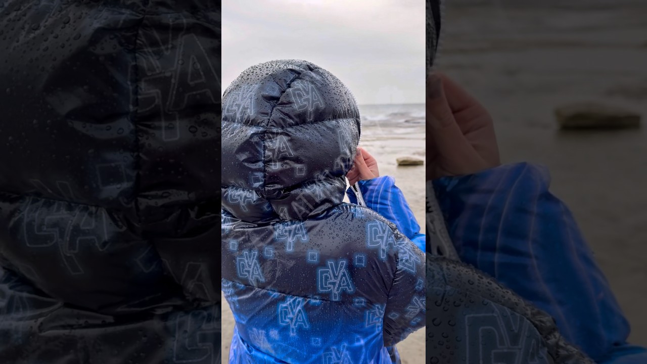Beautiful Wetlook Lady waterproof shiny nylon puffa raincoat Hunter wellies stuck rain sea splashes