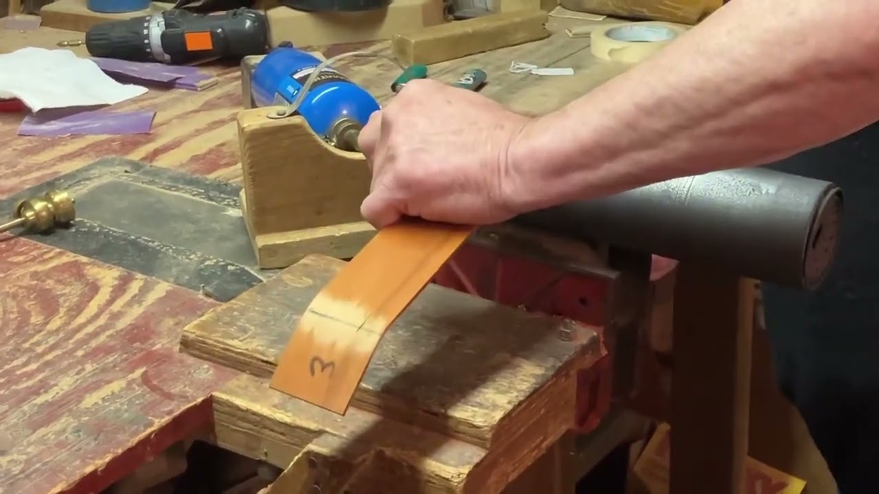 Bill Berg bending the sides for hourglass mountain dulcimers.