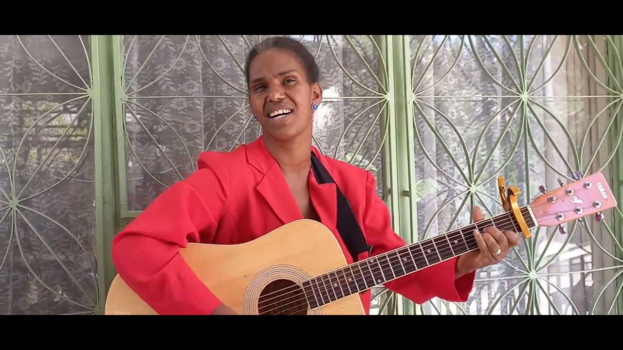 በየወለጋ ወርቅ ኃይሌ   /ኩቼ/