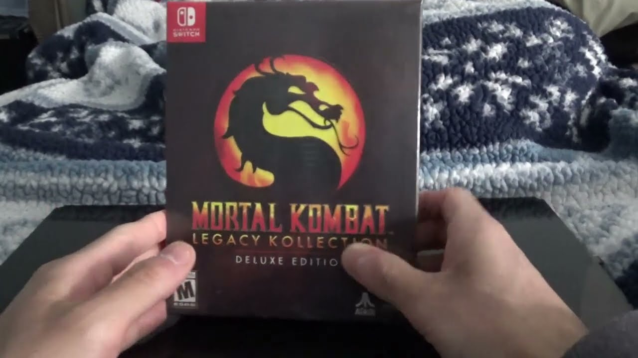 Распаковка и обзор/критика игры Mortal Kombat Legacy Kollection Deluxe Edition для Nintendo Switch.