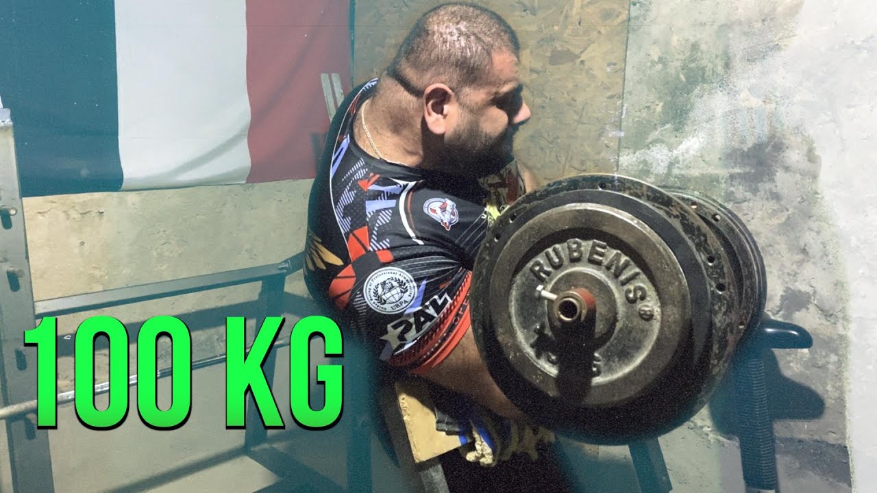 100 KG (225 LB) One Hand Biceps Curl and 250 KG (551 LB) Bench Press