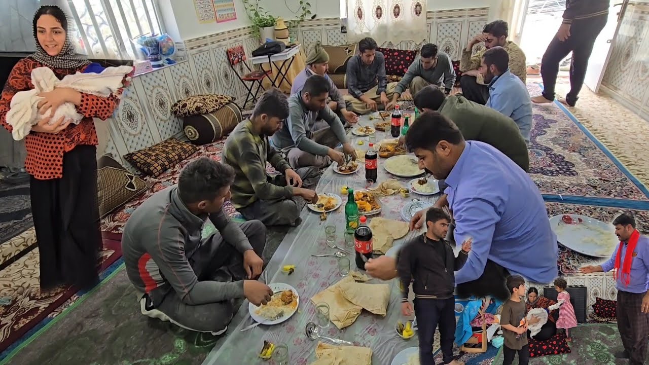 Continuing to pour concrete on the floor of the house and preparing lunch for the workers by Narges
