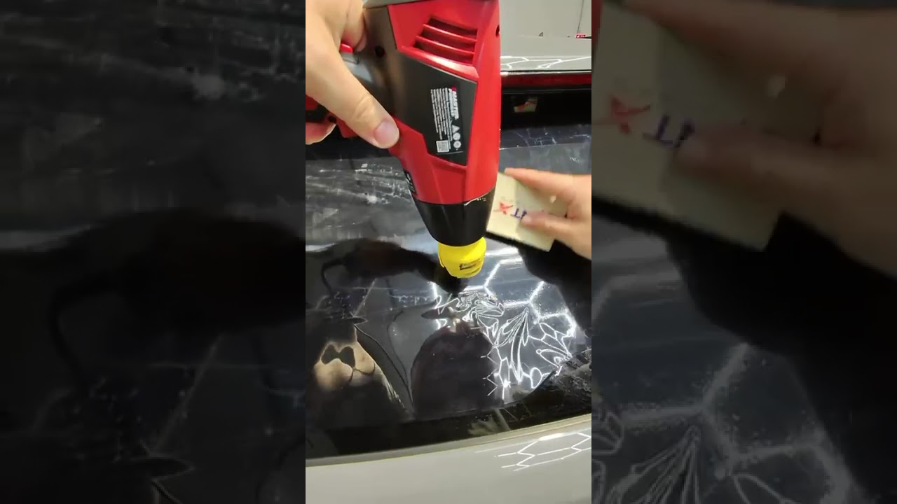Rear window tint prep on a BMW X5—plotter cut, heat shaped, trimmed, ready to install.