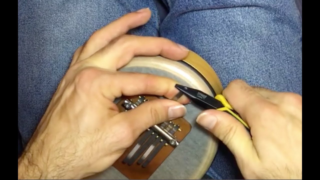 How to put a tine back into a Sansula