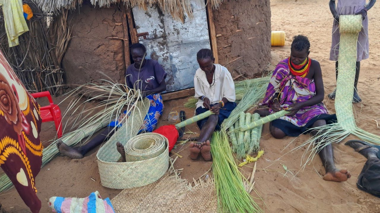 Women weaving  Traditional  Baskets,mats and brooms Using palm leaves/African village life