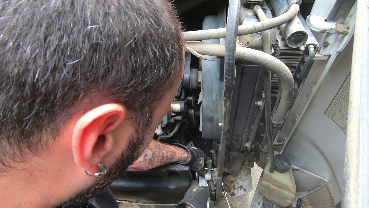 Changing a water pump in a bobcat 335 excavator with a Kubota v2203 part 1