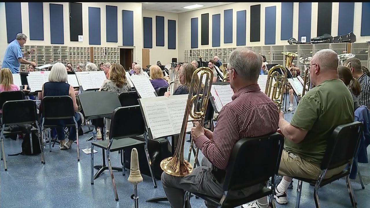 Conductor ready to pass baton for community band