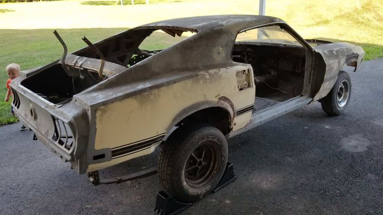 Я нашел ржавый Mustang Mach1 Fastback 69 года (то, что я ищу)