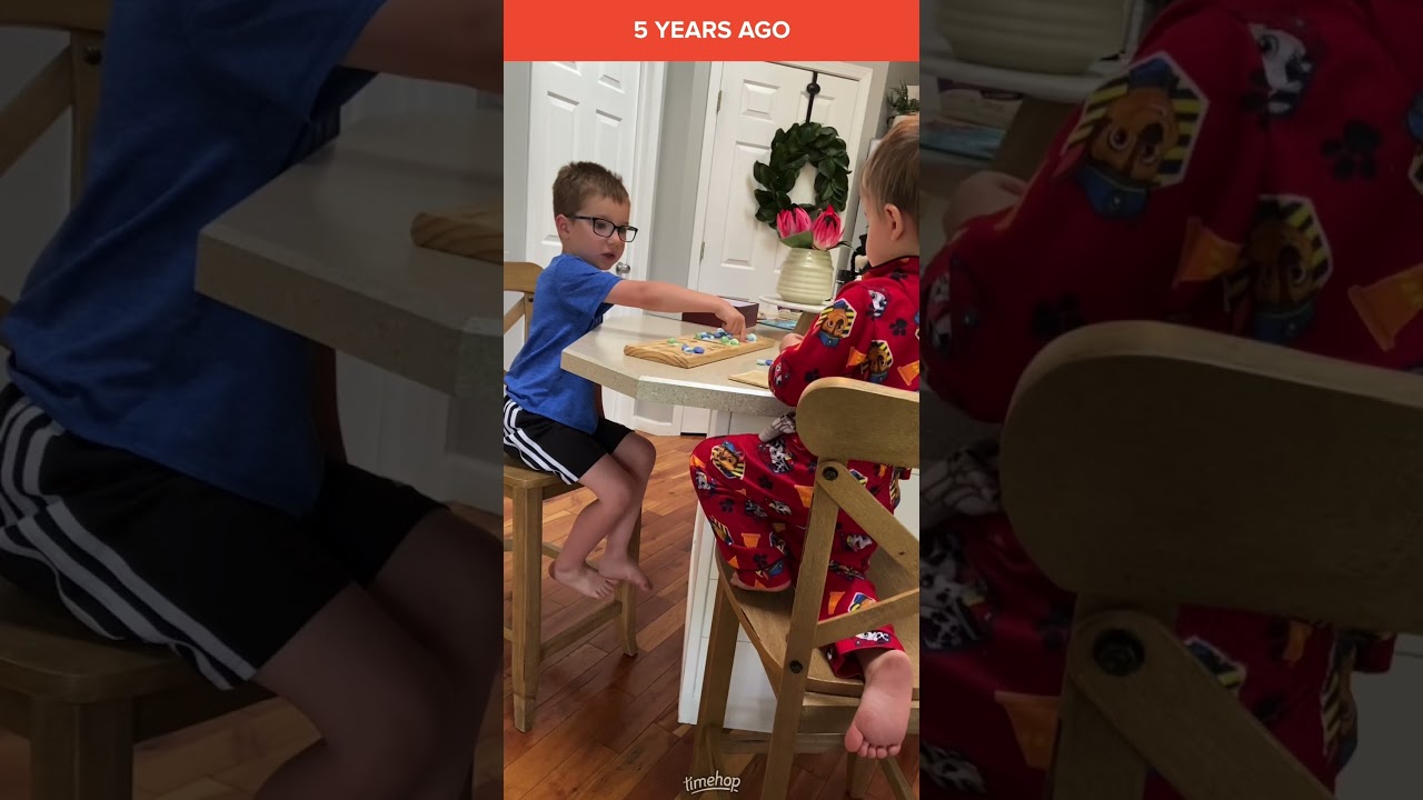 Boys playing mancala