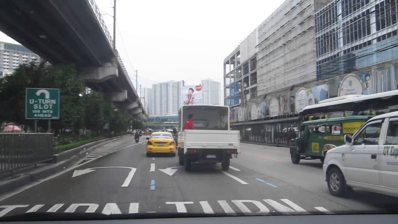 Driving on EDSA through Manila, Philippines