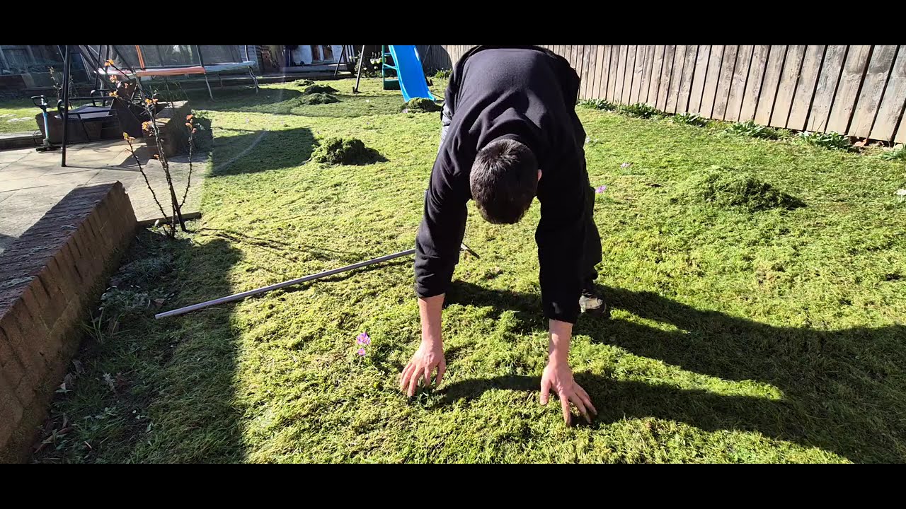 Raking up the grass 
