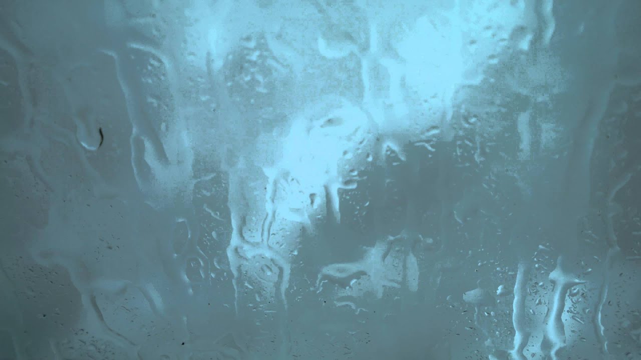 Rain on a window pane - 4K wall art background