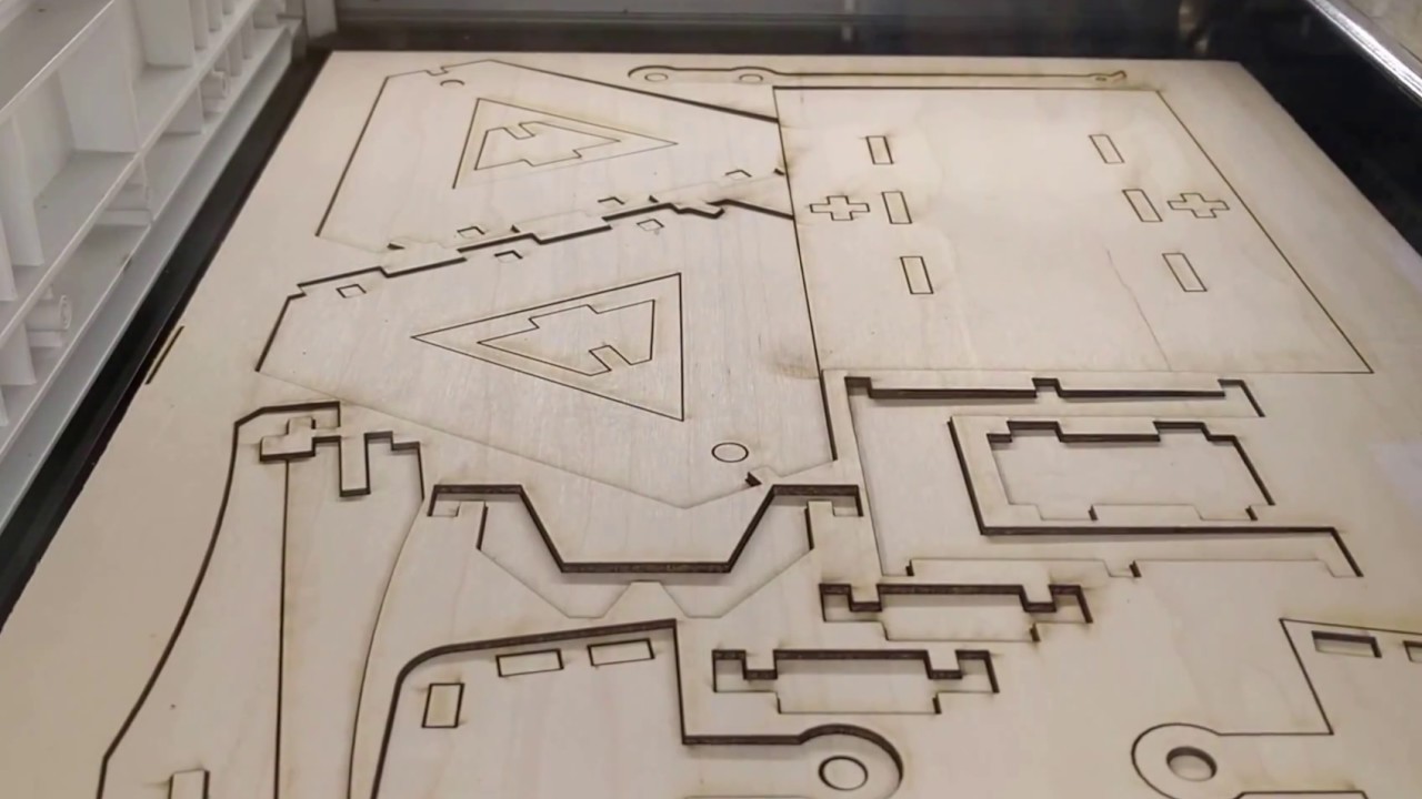 Using a Glowforge to design a laser-cut trebuchet (and the camera holder to film it, too).