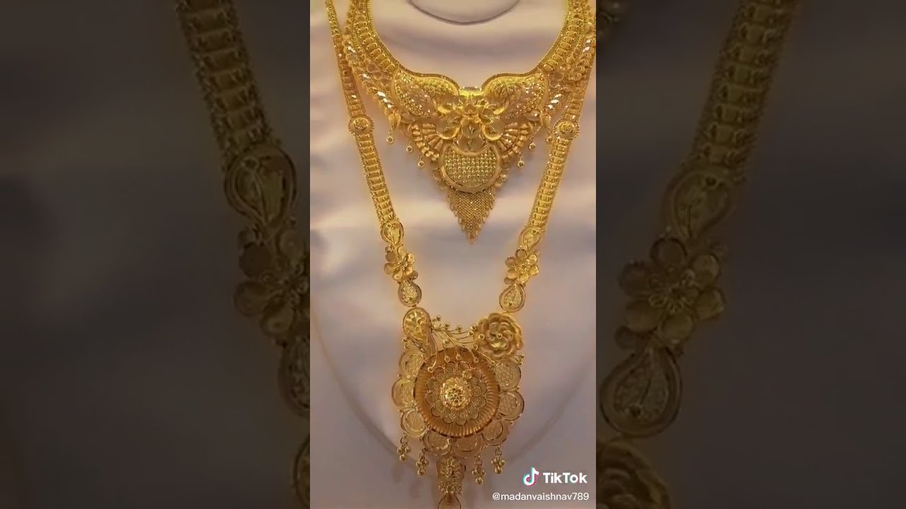 gold necklace and Rani haar design.