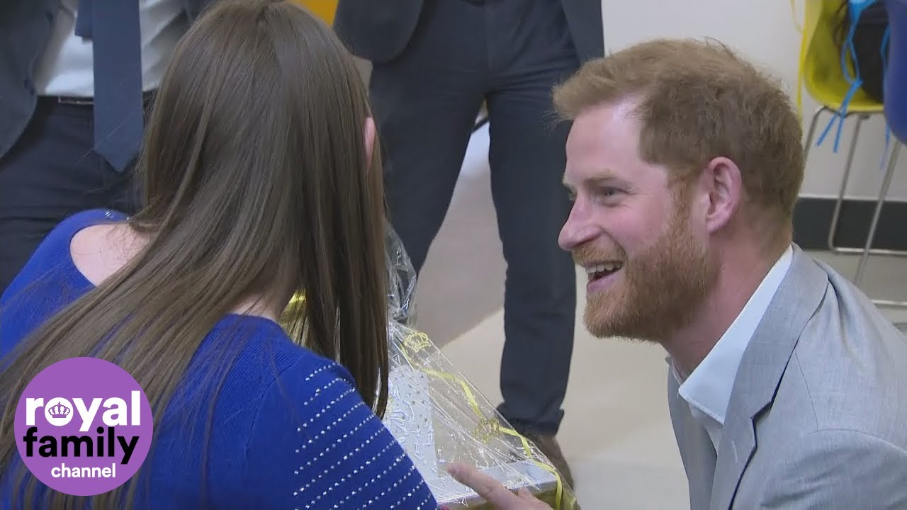 Prince Harry receives baby gift at Youth Zone opening