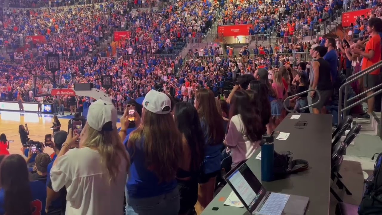 University of Florida Gators fans celebrate and storm the O'Dome court