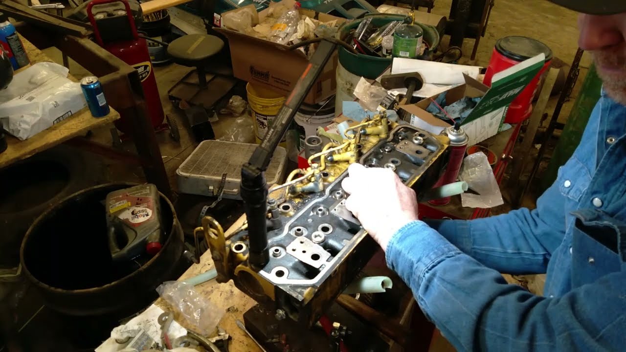 Cat 3034 valve guide replacement. 