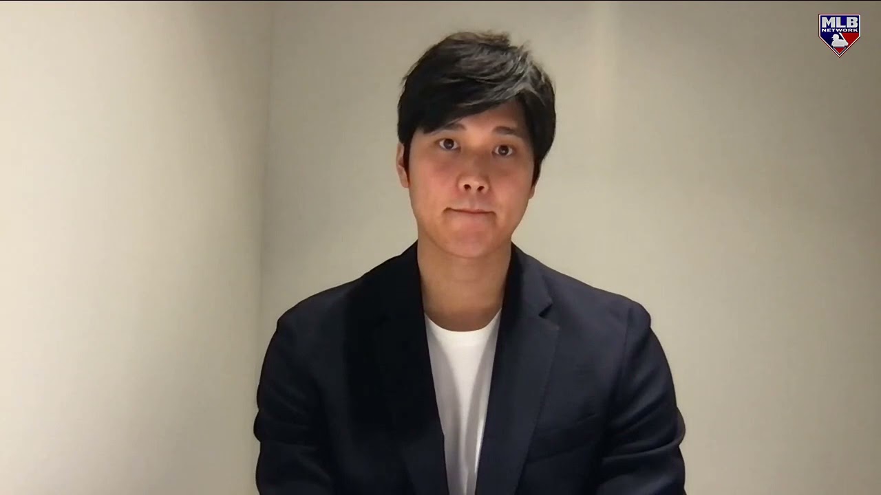 Shohei Ohtani reacts to being named the unanimous AL MVP