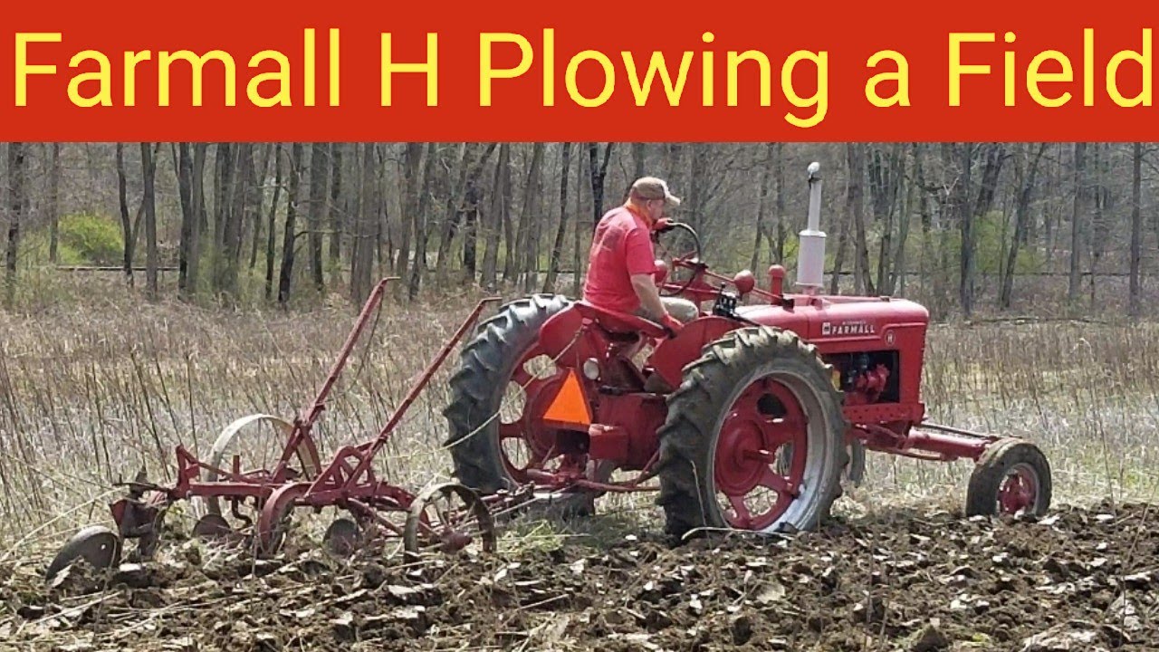 Farmall H Plowing a Field