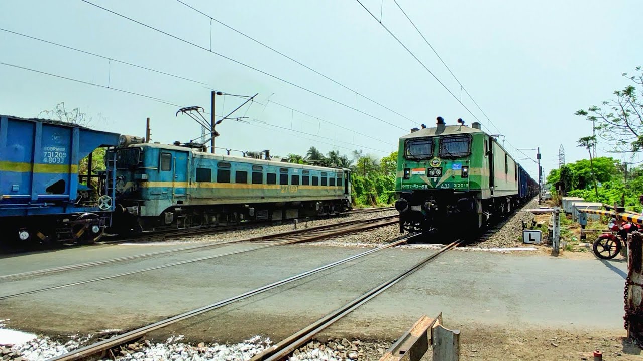 Perfect Train Crossing Fast Moving Freight Train Perfectly Skipping Through Railway Gate