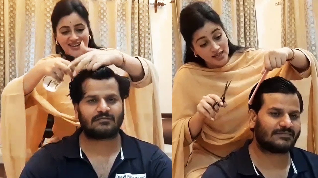 Navneet Kaur Cutting hair to her husband | MP Navneet Kaur Make fun with Her Husband- filmyfocus.com