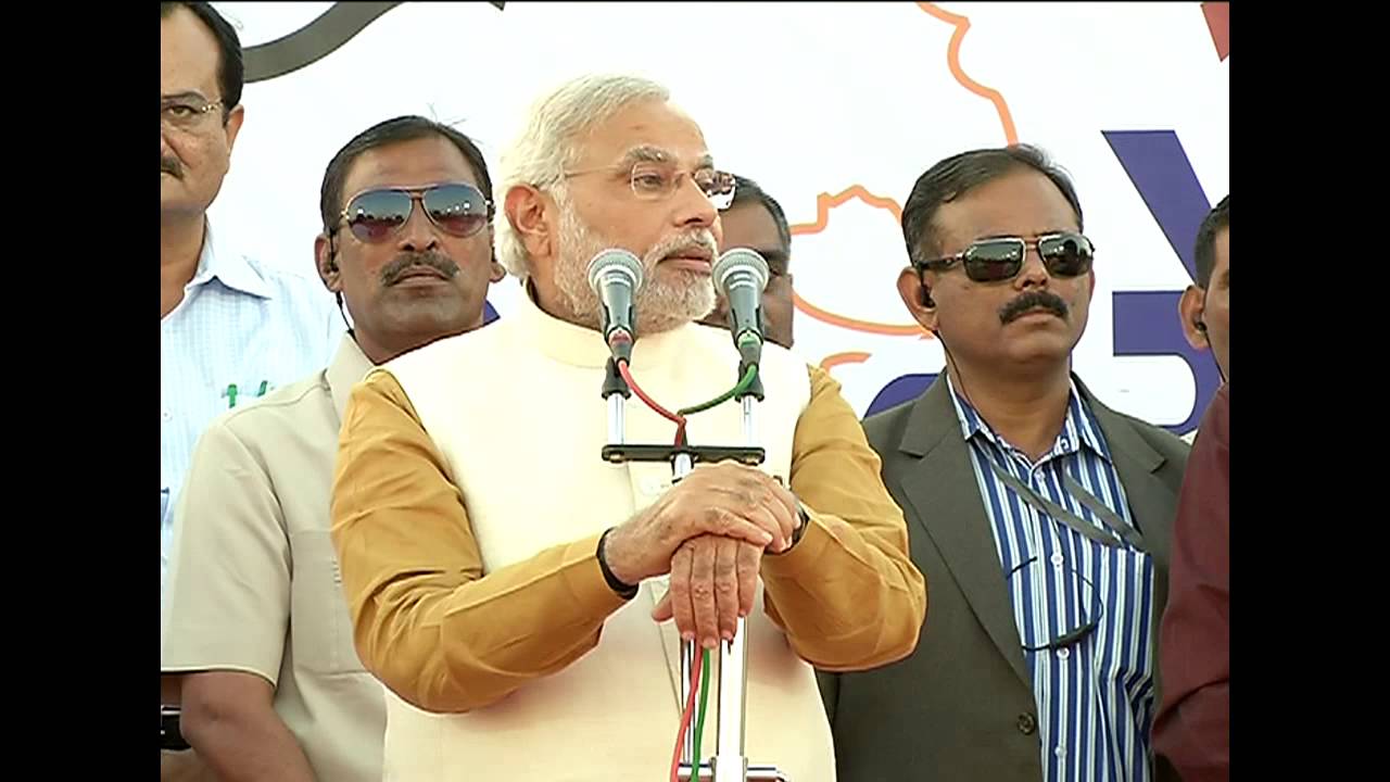 Shri Narendra Modi addresses a gathering of supporters at Ahmedabad Airport