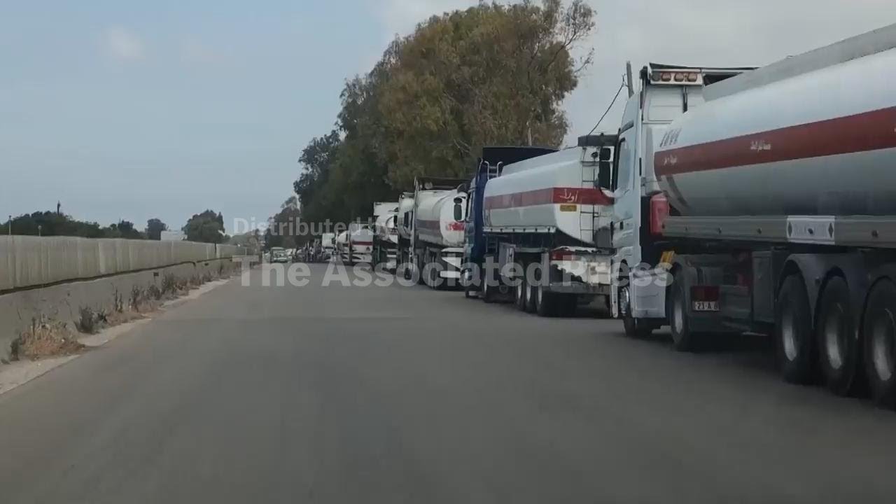 Convoy of oil trucks shows war-battered Syria selling itself as safe corridor amid regional conflict