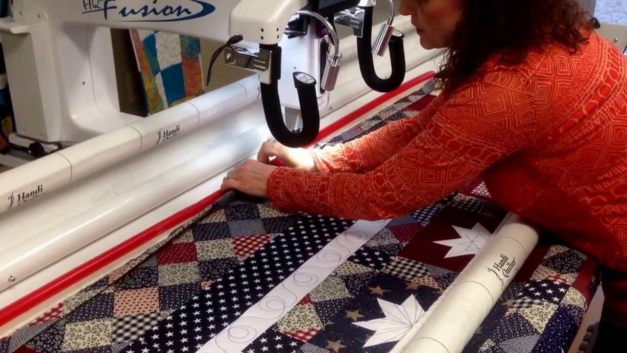 Attaching the binding to your quilt with a long arm machine.