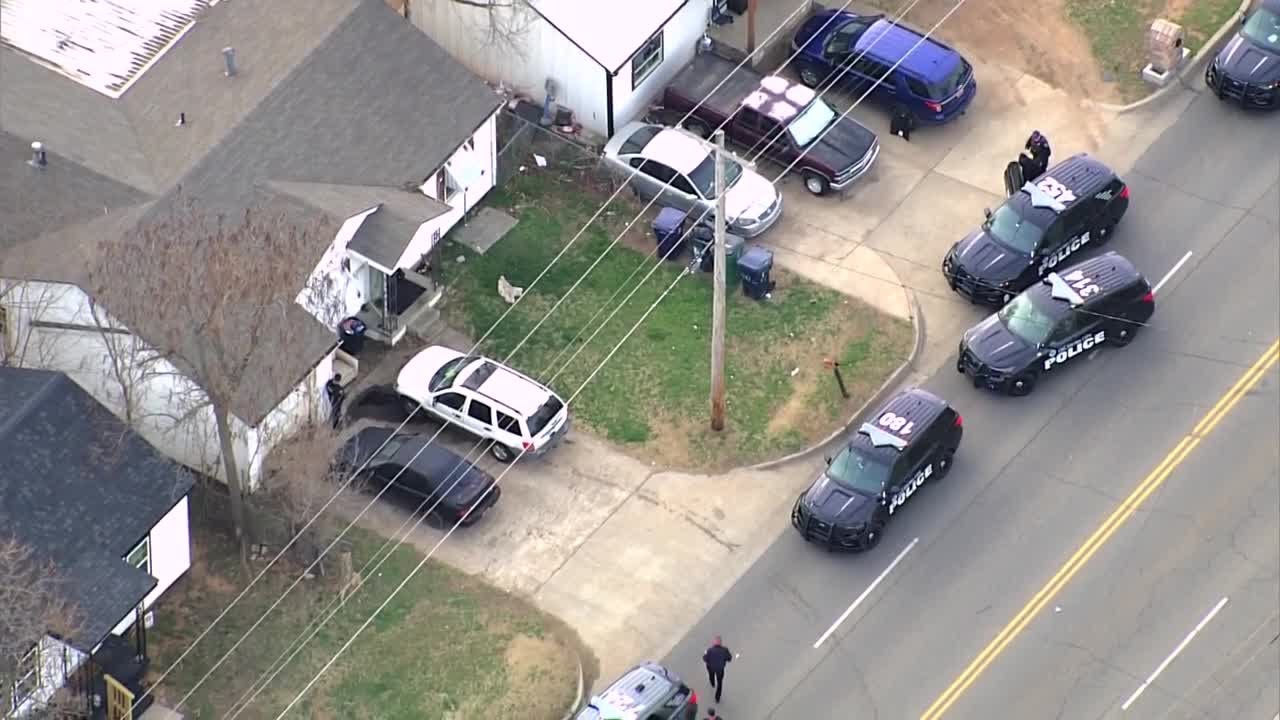 Multiple people placed in handcuffs amid large law enforcement presence outside OKC home