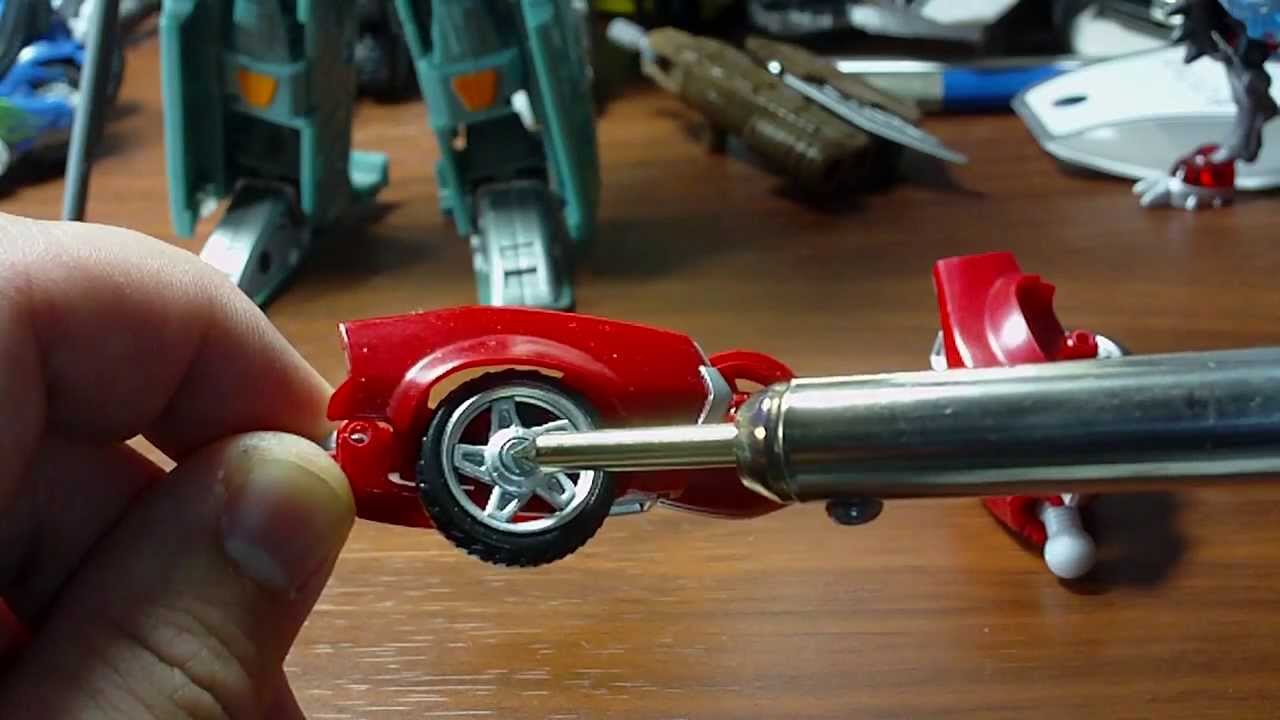 Toy customizing: Capped metal pin removal from joints
